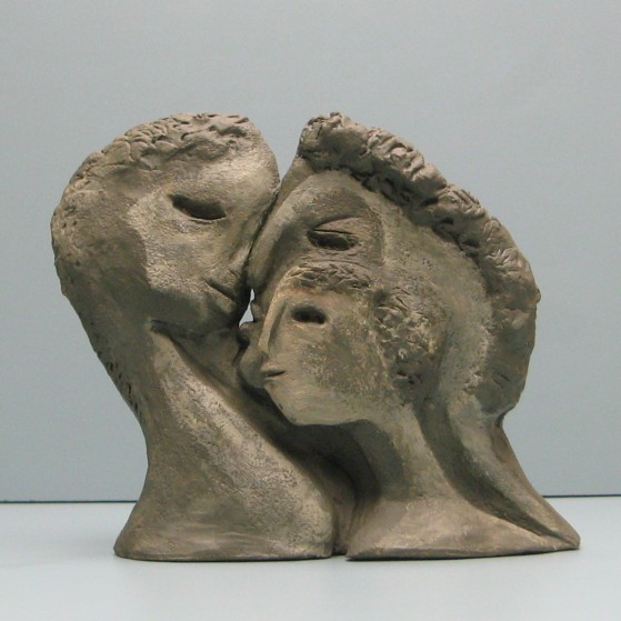 Family -2 sided.Made of Terracotta .Bronze cast is optional..8.5 H by 9 W by 3  inch D