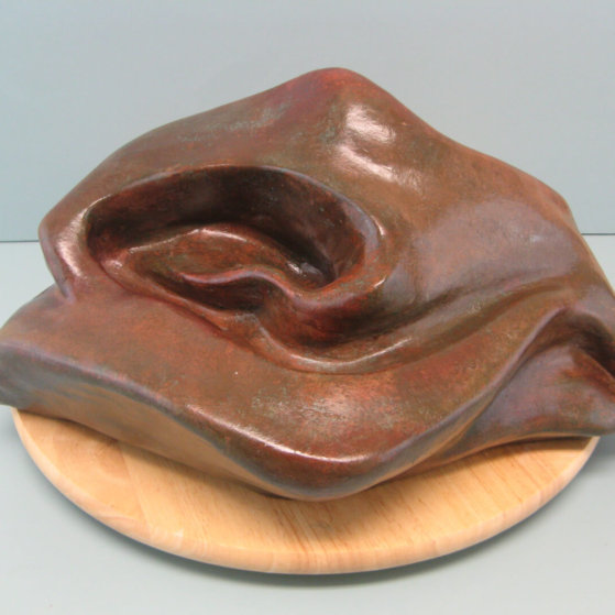 Sensual.Made of  Mixed powder clay and cement.
8 H by 17.5 inch Long,by 12 W