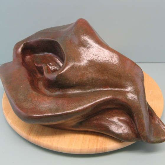 Sensual.Made of  Mixed powder clay and cement.
8 H by 17.5 inch Long,by 12 W