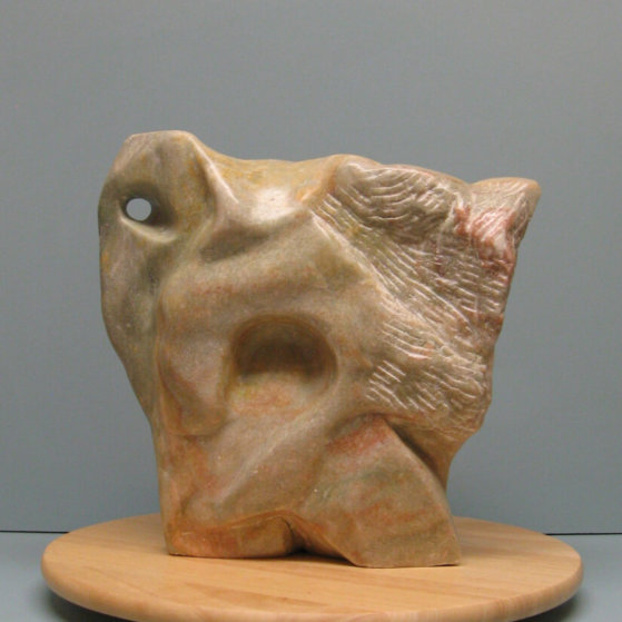 Abstraction of animals.Made of Alabaster stone.12 H by 30.5 inch perimeter