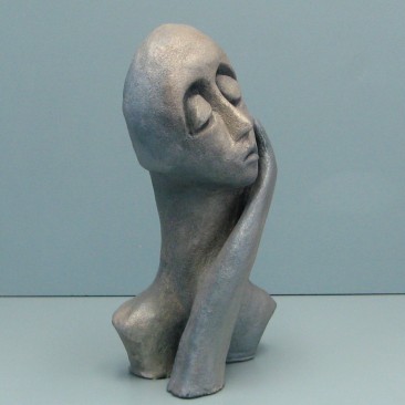 Full of herself.
Made of clay.There is an option to cast in Bronze.13 H by 18 inch perimeter